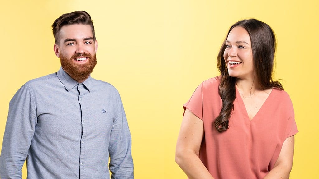 two Nutshell employees standing next to each other on a yellow background